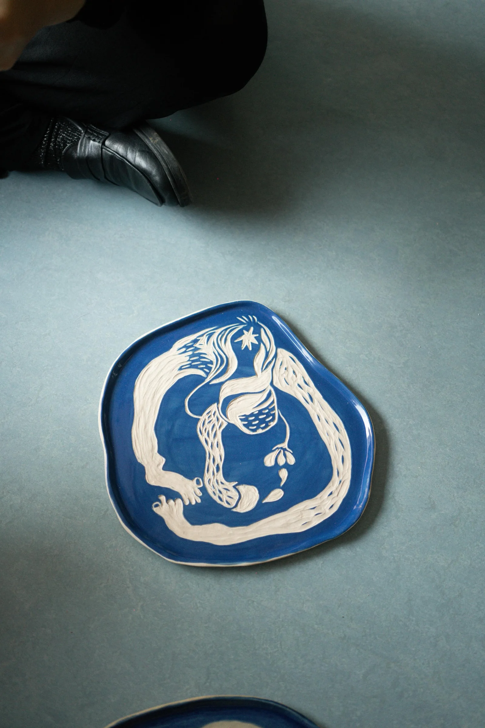 Clay pieces exploring the human form