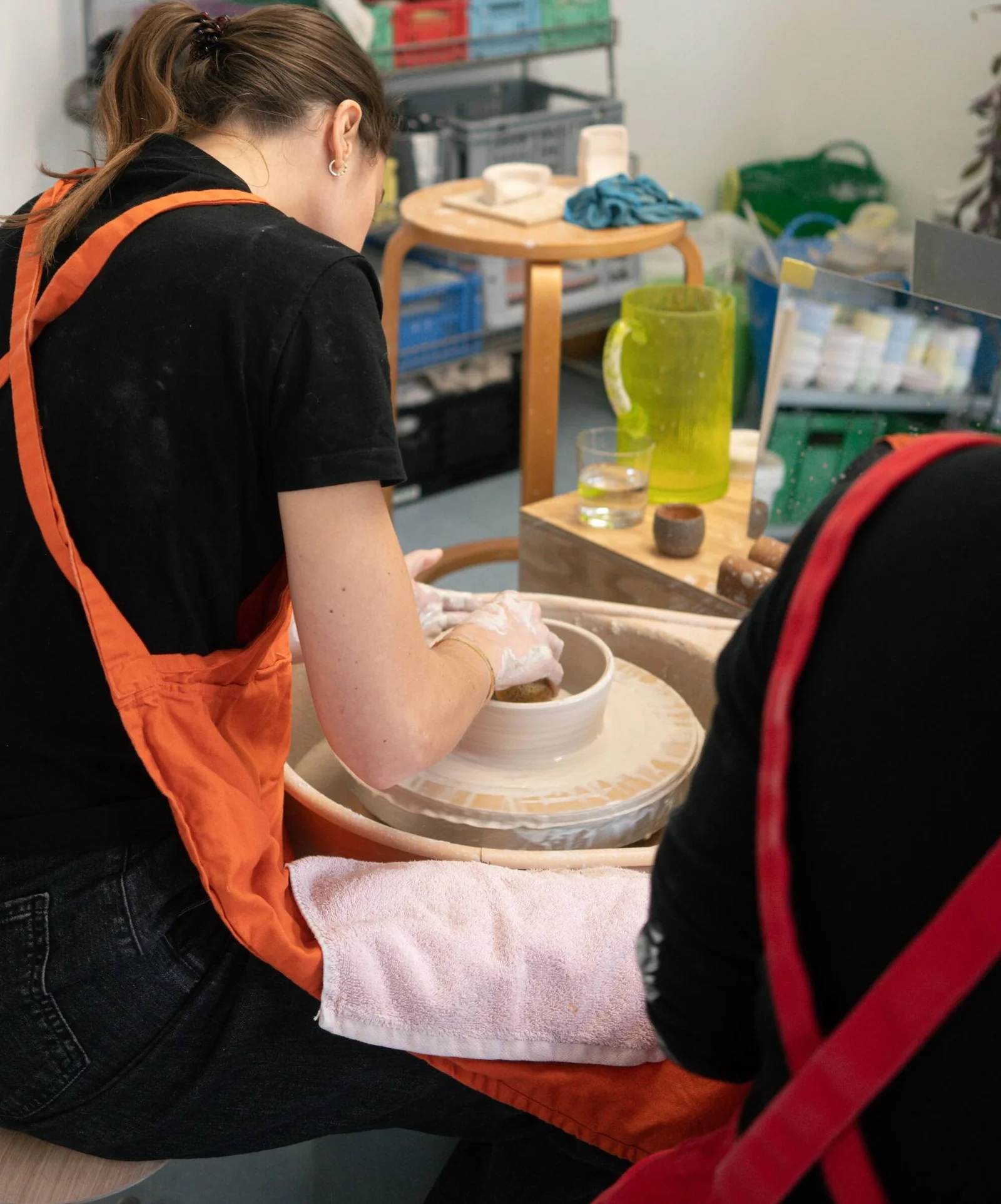 Close-up of wet clay spinning on the wheel